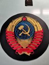 Машинная вышивка герба СССР на коже